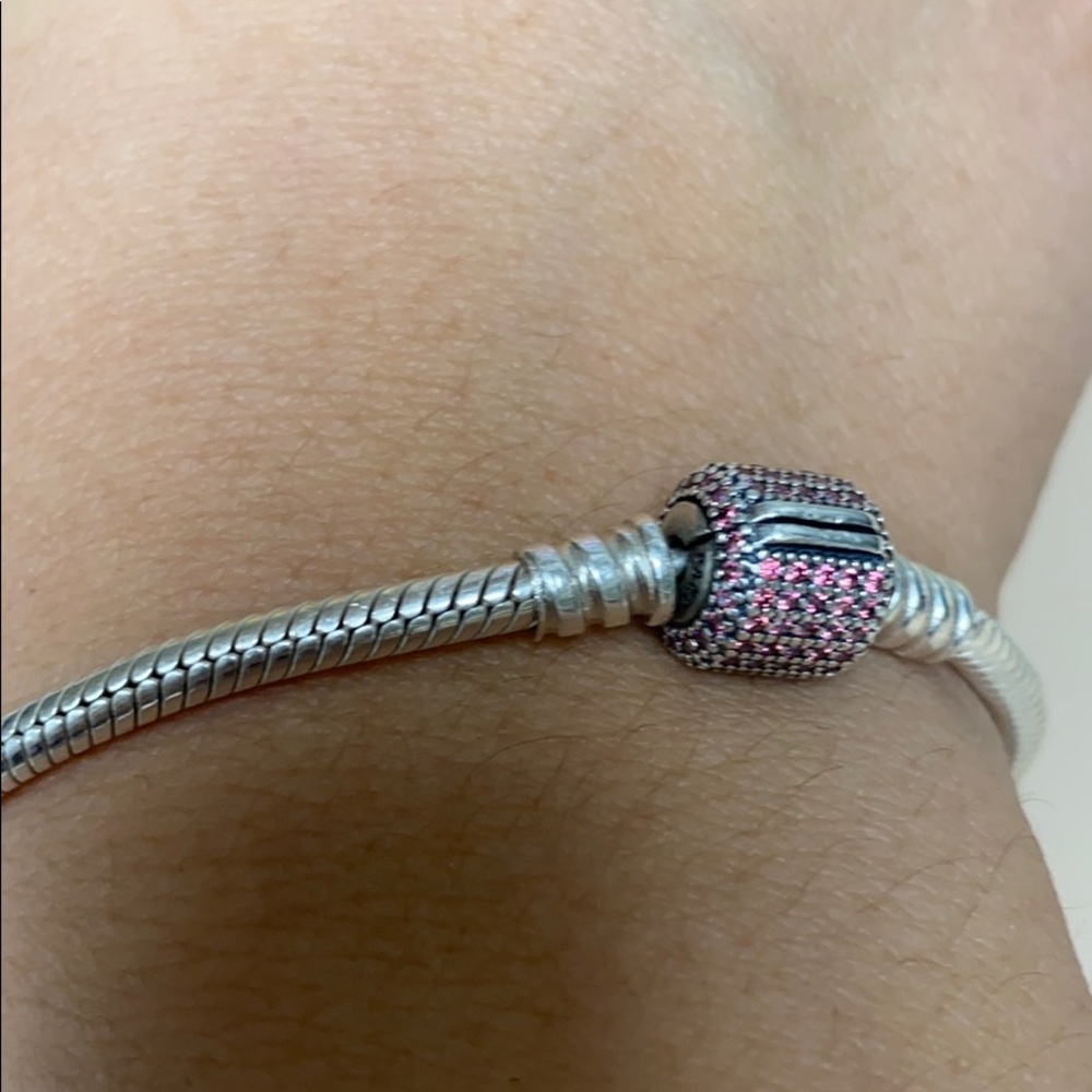 Pink pandora exclusive bracelet.